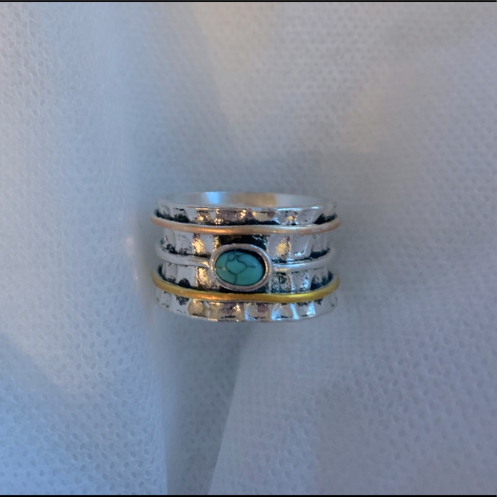 Women’s size 12 wide fashion statement ring.